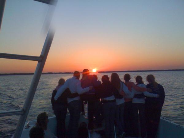 cruise under the sunset with dolphin cruises aboard the cold mil fleet